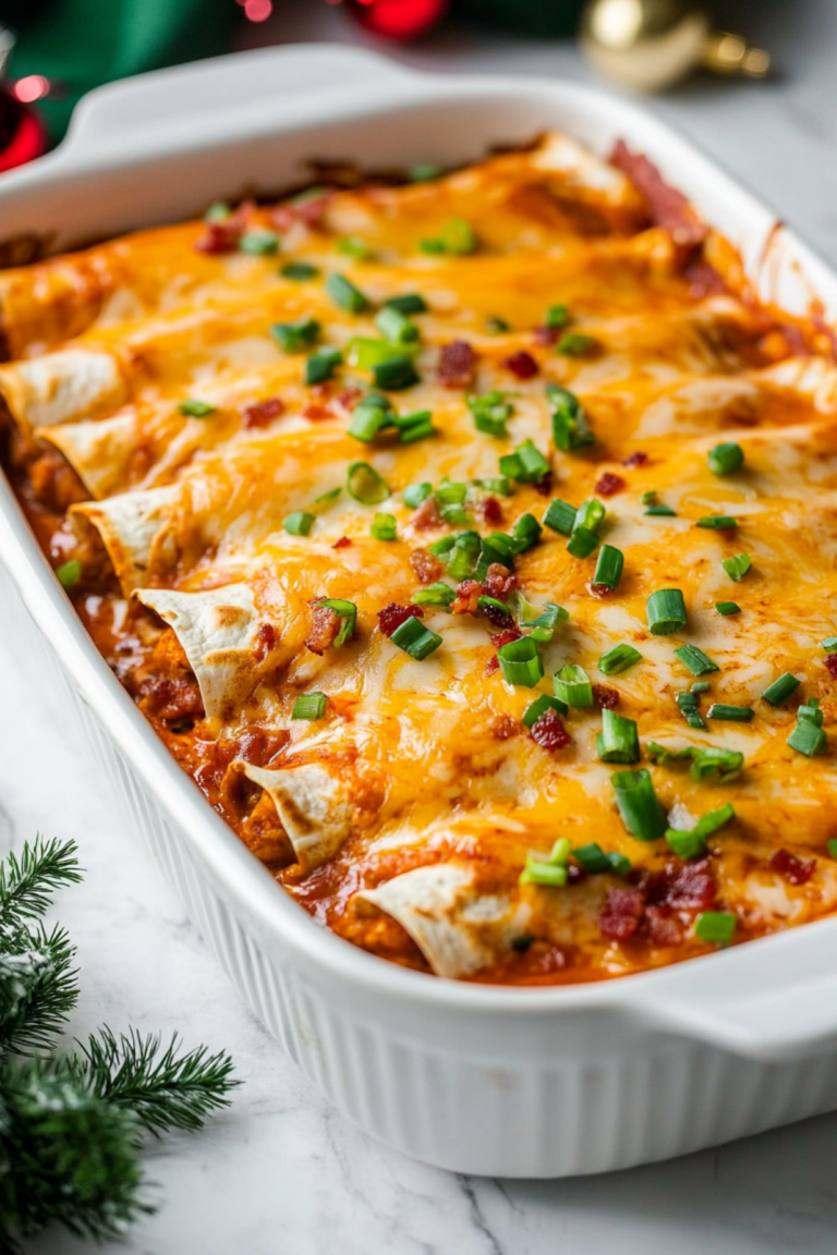 baked cheesy chicken enchiladas in a baking dish