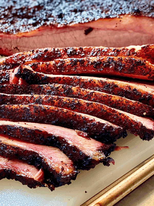 sliced brisket with crusty exterior and smoked inside