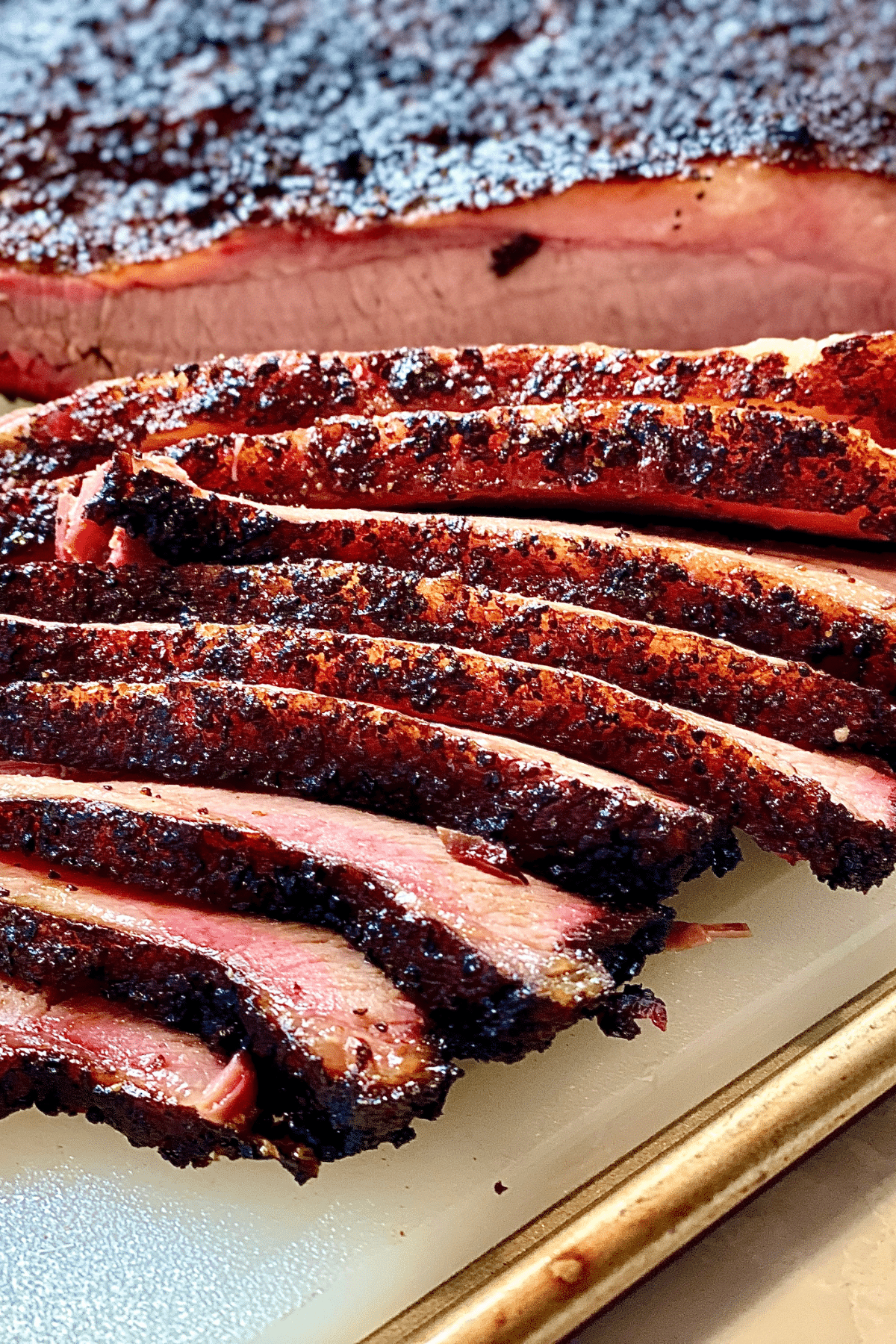 sliced brisket with crusty exterior and smoked inside