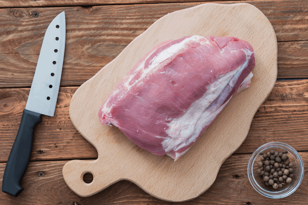 knife with brisket ready to trim
