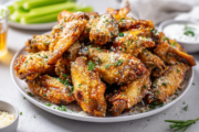 Crispy Baked Garlic Parmesan Wings party ready crispy baked garlic parmesan wings on a platter