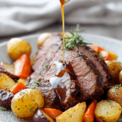 serving of cross rib roast, veggies, and au jus