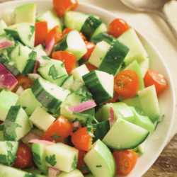 cucumber tomato and onion salad with a vinaigrette