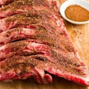 dry rub for ribs sprinkled on a rack of ribs - closeup view