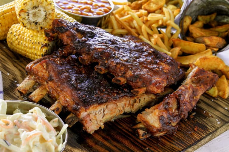 dry rub ribs recipe served with side dishes