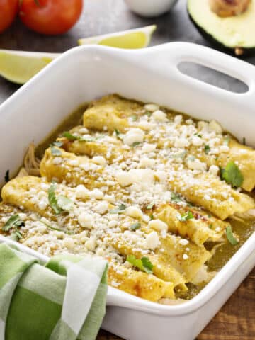 Enchiladas Verdes with Cotija cheese sprinkled on top