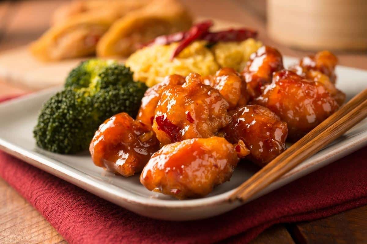 general tso's chicken served with broccoli and rice