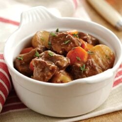 instant pot beef stew in a ceramic bowl
