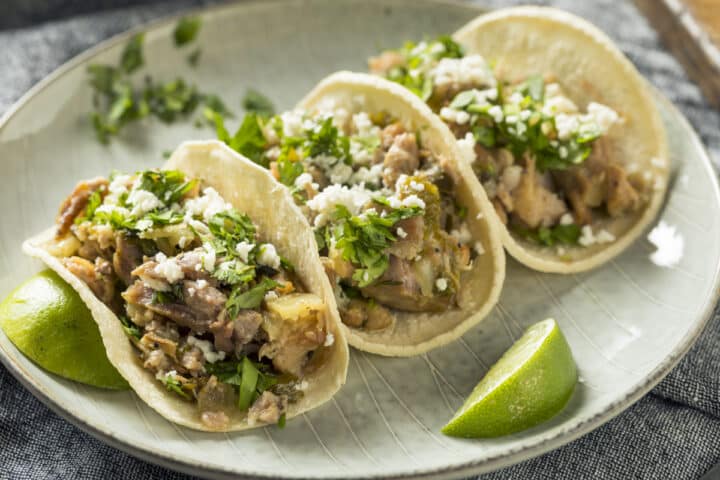 Instant Pot Carnitas sprinkle with cotija and cilantro