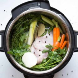 Instant Pot Chicken Stock ingredients in the pressure cooker