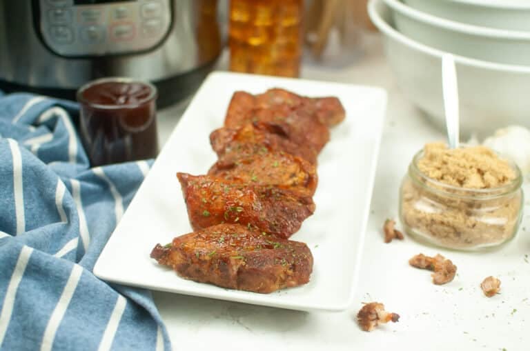 instant pot country style ribs arranged on a white plate