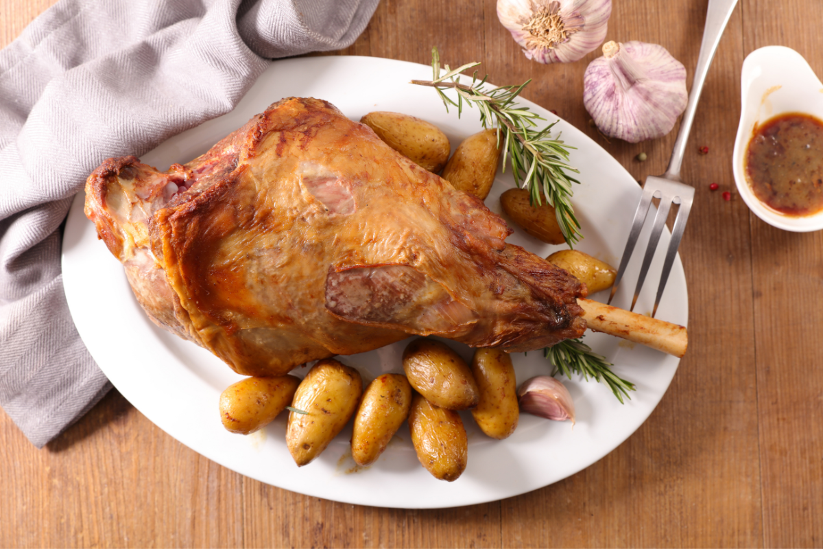roast leg of lamb serving for a festive dinner