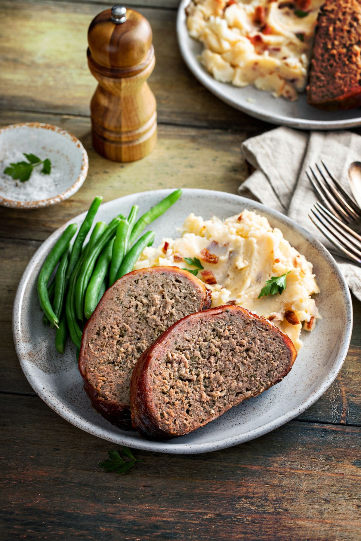 meatloaf served with mashed potatoes and green beans