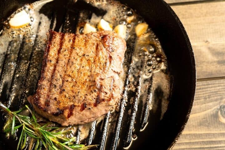 chuck steak in cast iron grill pan