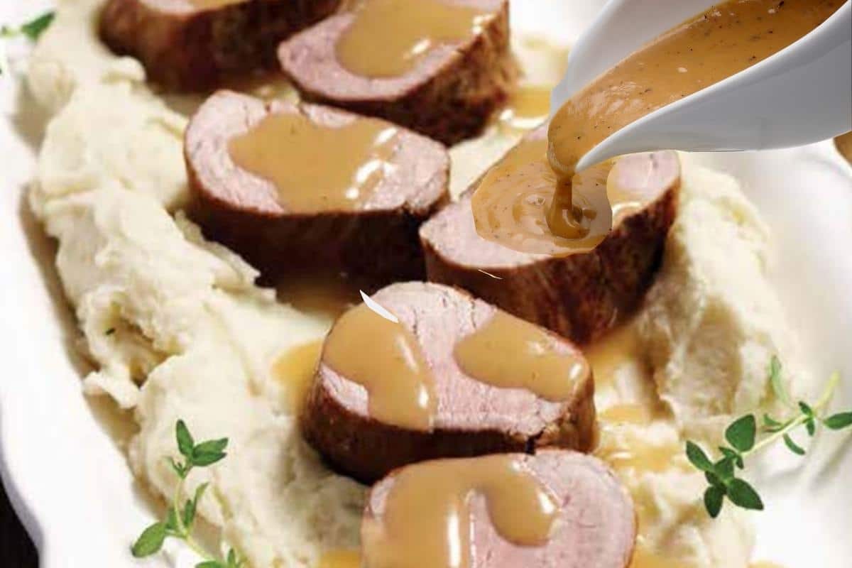 pouring gravy over sliced pork tenderloin